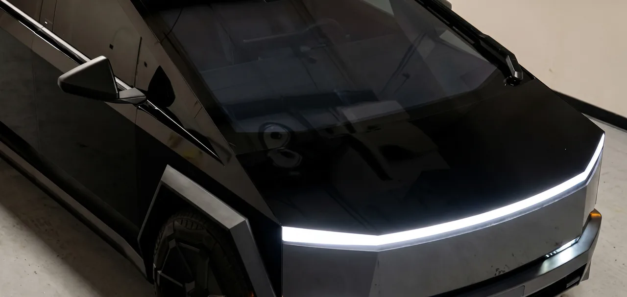 A Tesla Cybertruck finished in black film by Auto Trim Plus