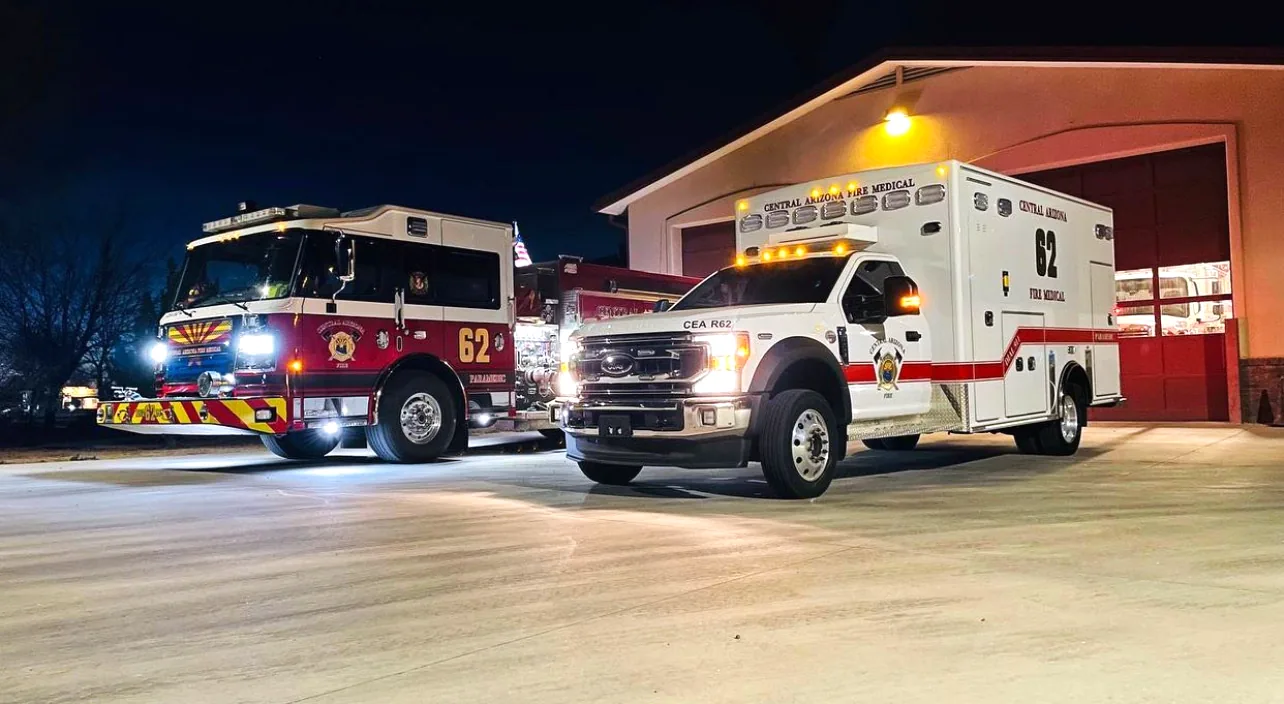A Central Arizona Fire Medical engine and rescue unit outside the station at night