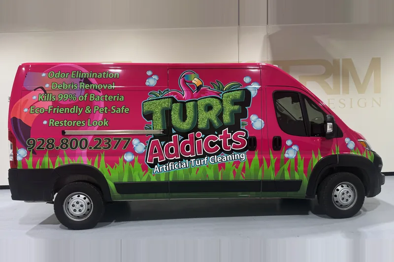 Turf Addicts high-roof service van in a pink and green full wrap