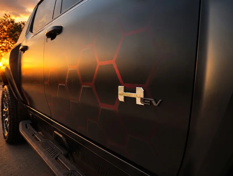 HEV truck at sunset